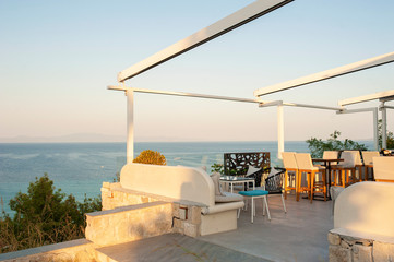 Beautiful seaside restourant with panoramic seaview - obrazy, fototapety, plakaty