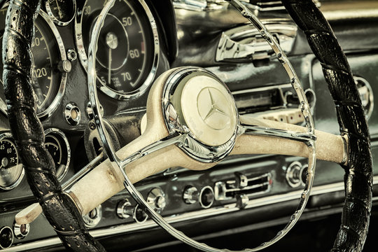 Retro styled image of the dashboard of a 1960 Mercedes-Benz 190 SL Pagode in Drempt, The Netherlands on November 19, 2014