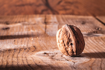 Macro walnut on an old table.