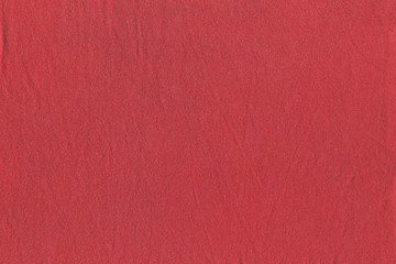 texture of slightly wrinkled red fabric