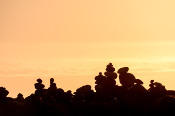 Stack of stones on the sea beach