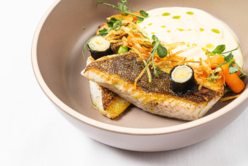 fish with mashed potato and vegetables