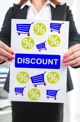 Discount concept shown by a businesswoman