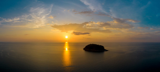Fototapeta na wymiar aerial view sunset above Karon Beach is a famouse landmark and popular sunset viewpoint of Phuket Thailand