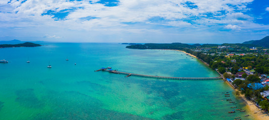 Aerial view drone shot of long tail boat at rawai beach,phuket Thailand.