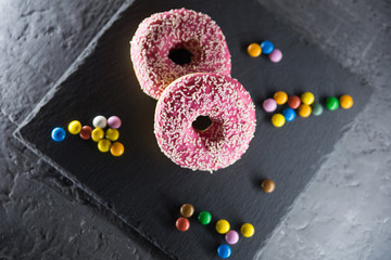Donuts in the glaze are laid out on the table.