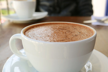 Cup of Tasty Hot Chocolate Served at a Cafe in the Old City of Cusco, Peru	