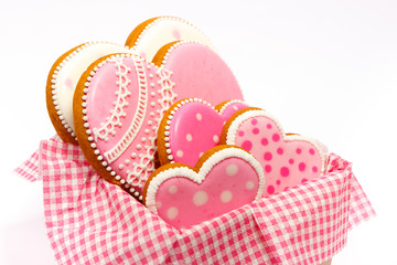 Set of pink heart shaped cookies with patterns, handmade