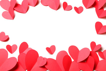 Cut out of red paper hearts on white background isolated.