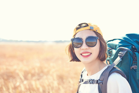 Korean woman is backpacking on an island in Korea.