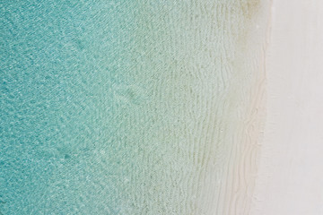 Beach perfect white sand turquoise water top view, aerial landscape, calm sea waves and clear water...