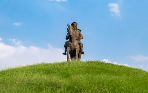low angle front view of Warrior Bhai Baaj Singh statue sitting on horse against sky in the background. historical concept.
