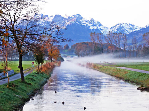 The river Rheintaler Binnenkanal in a village of R&uuml;thi SG (Ruthi SG or Ruethi SG) and in the Rhine river valley (Rheintal) - Canton of St. Gallen (SG), Switzerland