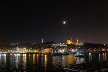 Fototapeta na wymiar Istanbul at night with a view of the Golden Horn and the Süleymaniye mosque