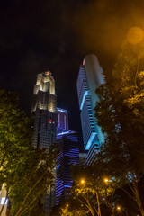 Singapore City, Singapore - 07 19 2015: High Skyscraper Buildings Against Sky In Singapore At Night.