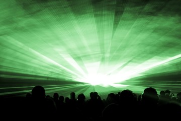 Green laser show nightlife club stage with party people crowd. Luxury entertainment with audience...