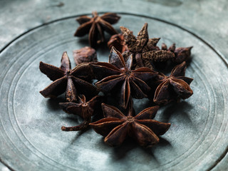 Star anise in a metal plate