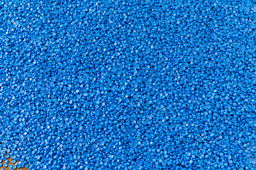 Close-up of plastic polymer granules. polymer plastic. compound polymer..plastic beads isolated on black background.