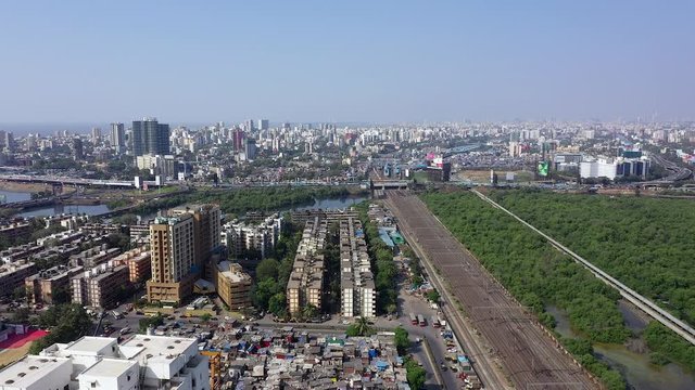 Aerial of city of Mumbai, India with apartment building.