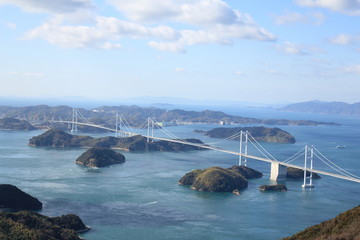 Naklejka premium Beautiful long bridge on the blue sea in Japan