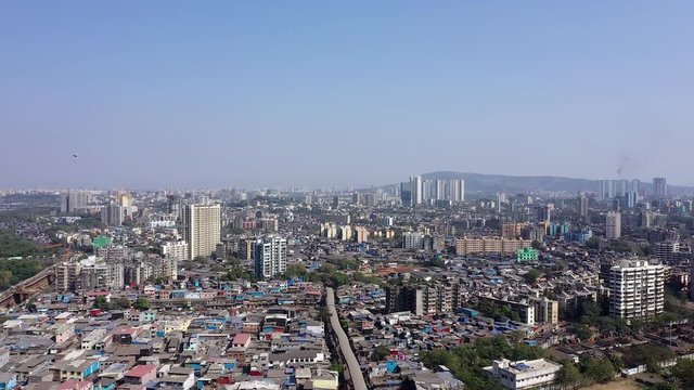 Aerial of Mumbai skyline with slums. India.