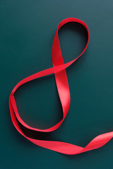 Red ribbon in the shape of a eight