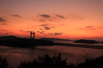 Beautiful sunset with a bridge at Shikoku in Japan 