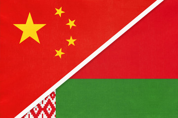 China or PRC vs Belarus national flag from textile. Relationship between asian and european countries.