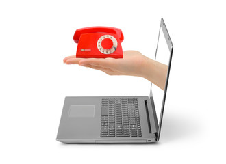 Hand with telephone and notebook