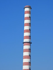 Zoom photo of industrial chimney coming from electricity power plant