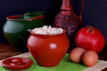 delicious food in clay dishware