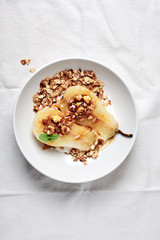 Poached pear with yogurt  and granola.