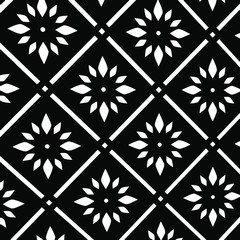 Black and white ceramic tile with geometric and floral pattern for wall and floor decoration. Concrete stone surface background. Texture for interior design project.