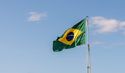 the flag in brazil fluttering in the wind.