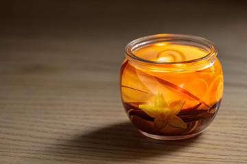 Aromatic candle in a glass jar