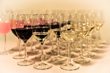 Crystal glasses with champagne are on the table.