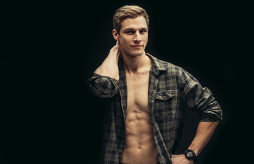 portrait of young caucasian man 20-25 years old with naked torso, handsome sexy male model with...