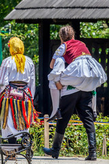 Humorous folk dancers after performing the show