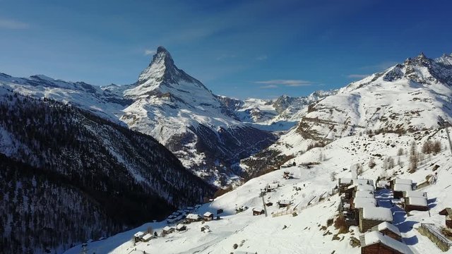 flying over findeln above Zermatt towards the Matterhorn on a beautiful winter day