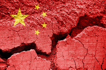 Chinese flag on cracked background. Coranavirus is China, health crisis and emergency concept