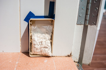 Pest control staff is installing termite bait stations