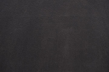The texture of the synthetic fabric is gray.