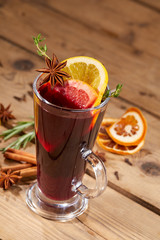 mulled wine on the wooden background