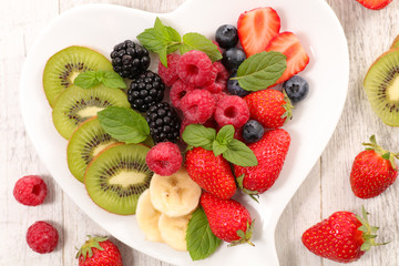 fruit salad with berry fruits- healthy food lifestyle