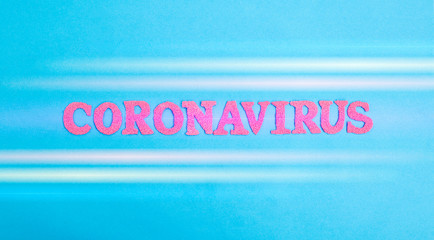 Word coronavirus in red letters on a blue background. Deadly virus concept in China, disease