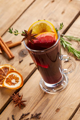 mulled wine on the wooden background