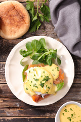 muffin with salmon, poached egg and sauce- egg benedick