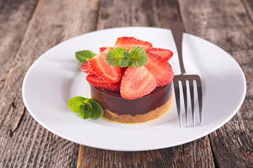 delicious chocolate cake and strawberry