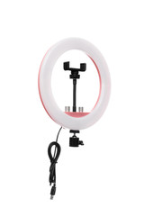 Closeup of circular neon LED lamp isolated white background. Popular modern light for make-up and beauty portraits.