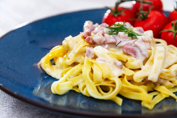 tasty Carbonara pasta on the table